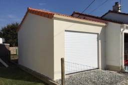 Garage Accolé béton enduit Doizon par Abridis